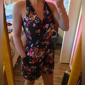 Woman’s Pocketed Floral Romper